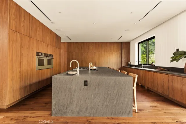a view of kitchen with furniture and window