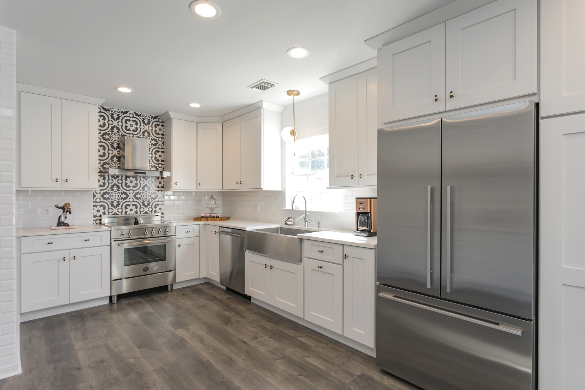 7596 Cherokee Hills Road Fairview, TN 37062 - Photo 1 of 31 a kitchen with kitchen island white cabinets and stainless steel appliances