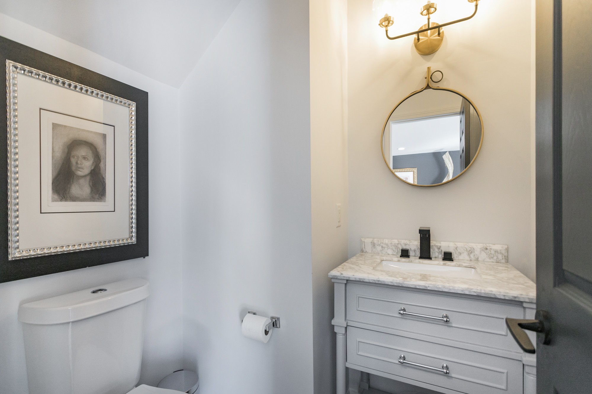 7596 Cherokee Hills Road Fairview, TN 37062 - Photo 13 of 31 a bathroom with a toilet sink and mirror