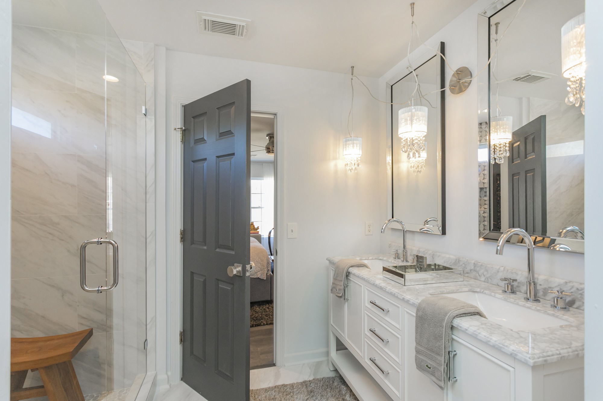 7596 Cherokee Hills Road Fairview, TN 37062 - Photo 21 of 31 a bathroom with a double vanity sink mirror and double