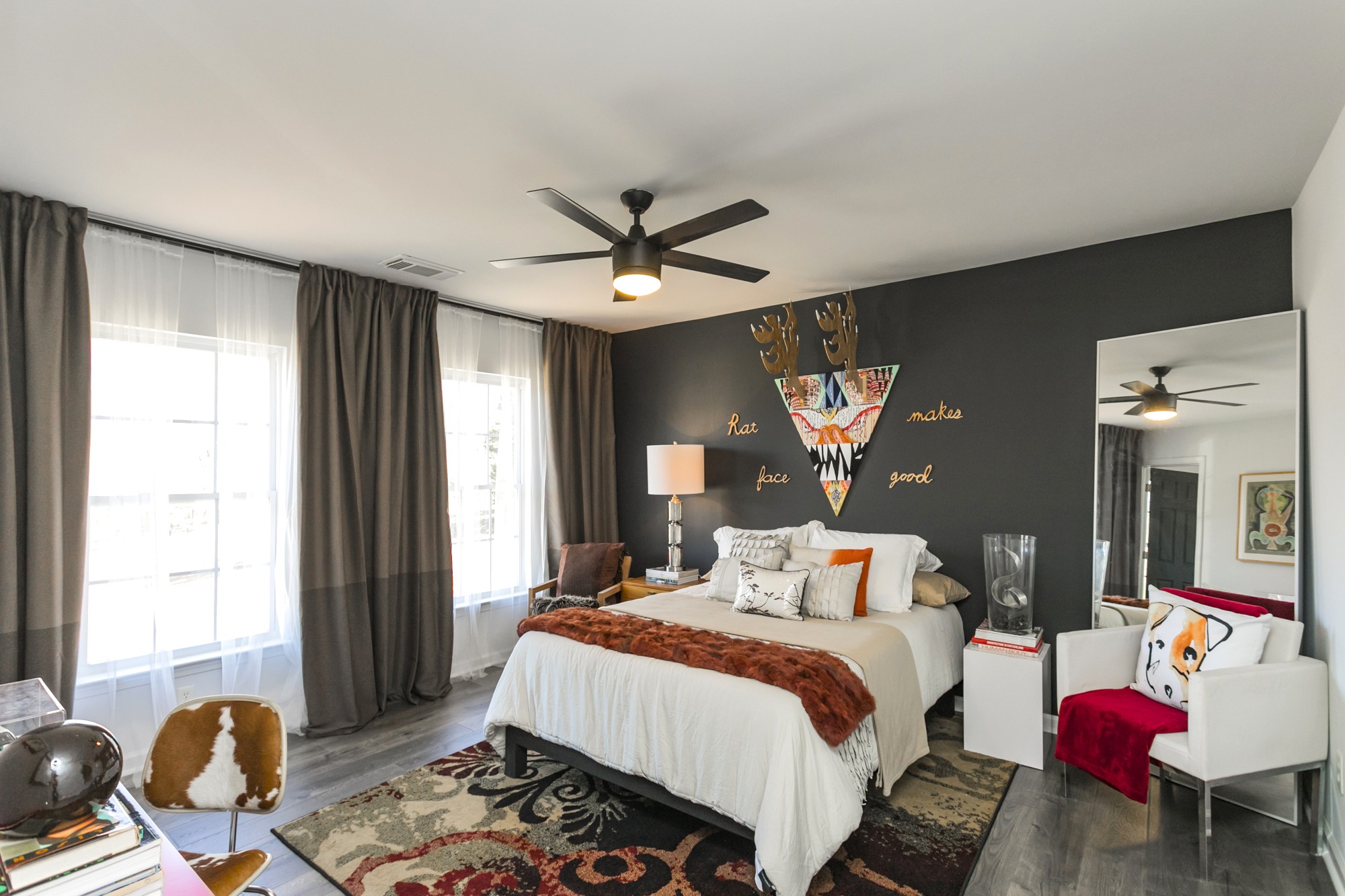 7596 Cherokee Hills Road Fairview, TN 37062 - Photo 23 of 31 a bedroom with a bed gym equipment and a large window