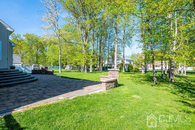 18 Ramsey Road Edison, NJ 08820 - Photo 14 of 54 a view of a park with bench and trees