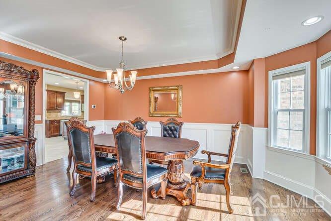 18 Ramsey Road Edison, NJ 08820 - Photo 22 of 54 a view of a dining room with furniture window and wooden floor