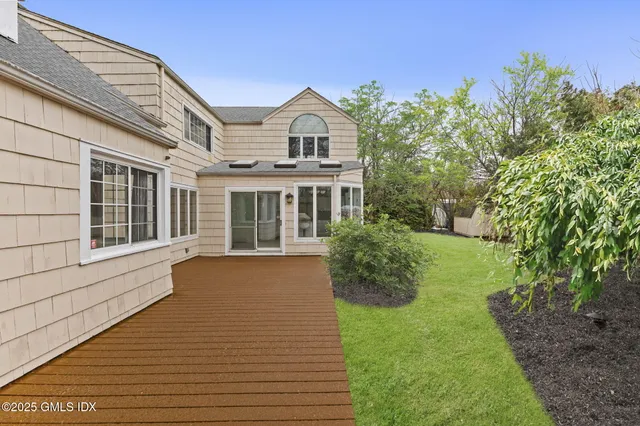 a house view with a garden space