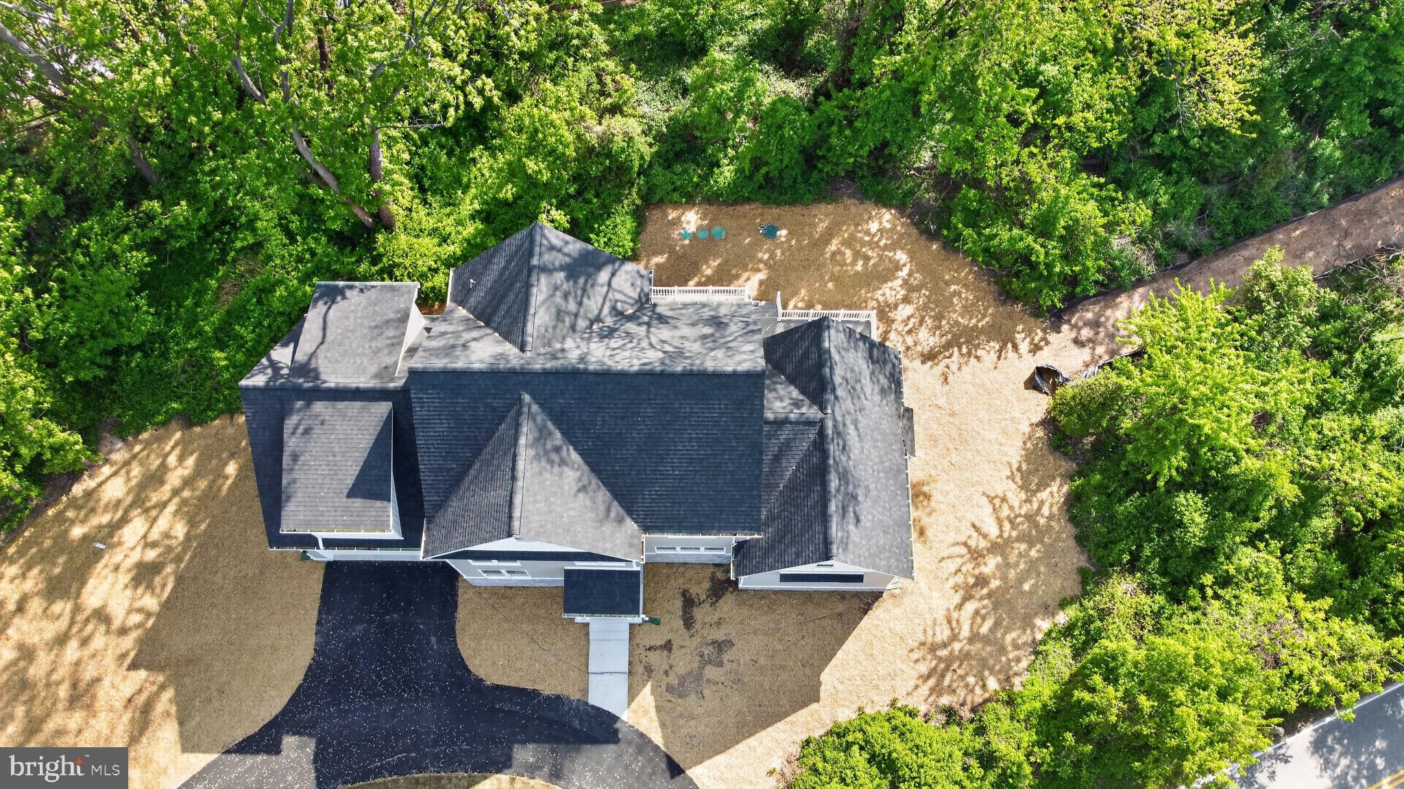 2001 Poplar Ridge Road Pasadena, MD 21122 - Photo 75 of 83 an aerial view of a house with swimming pool and large trees