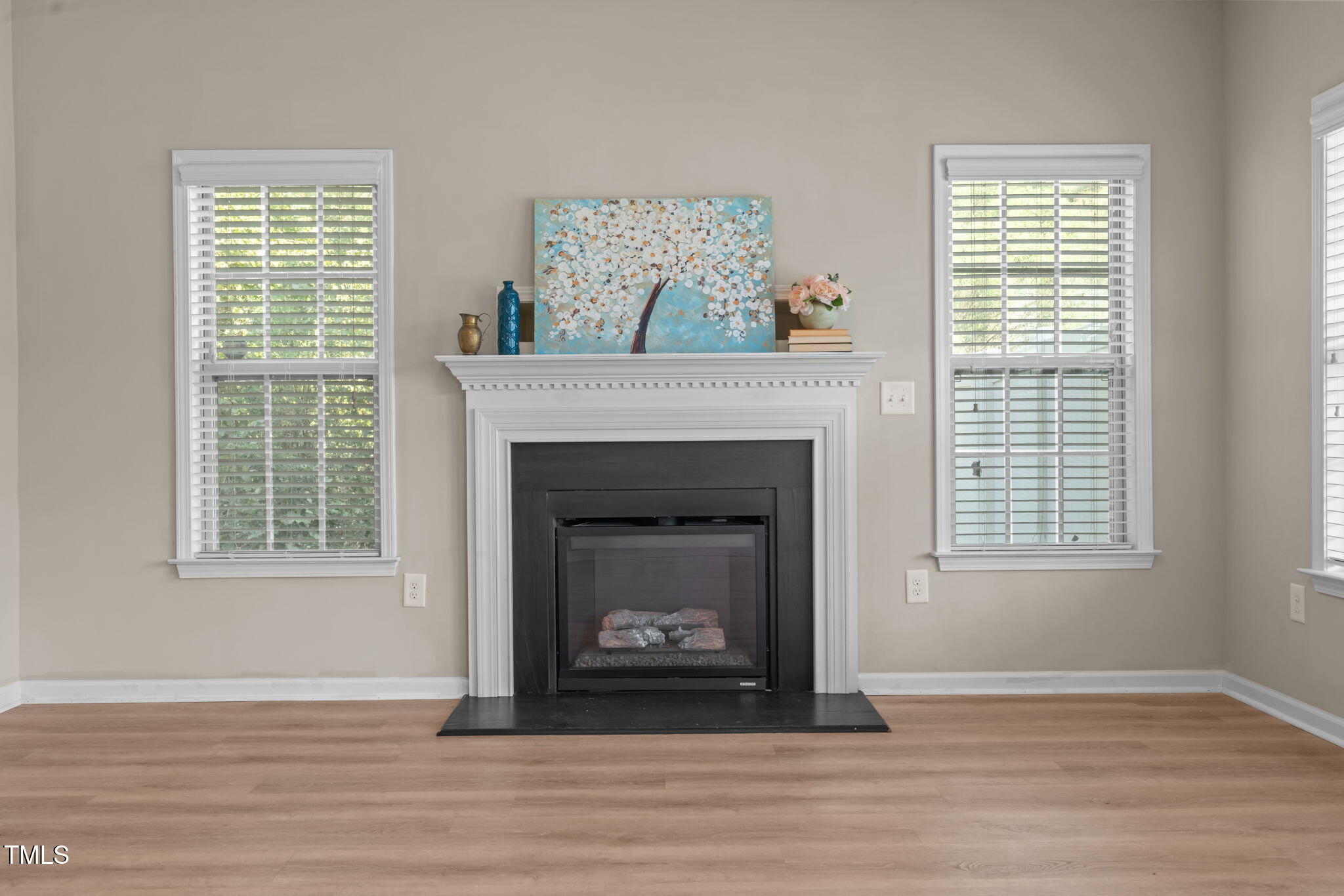 60 Taplow Trail Cameron, NC 28326 - Photo 17 of 50 a living room with a fireplace and windows
