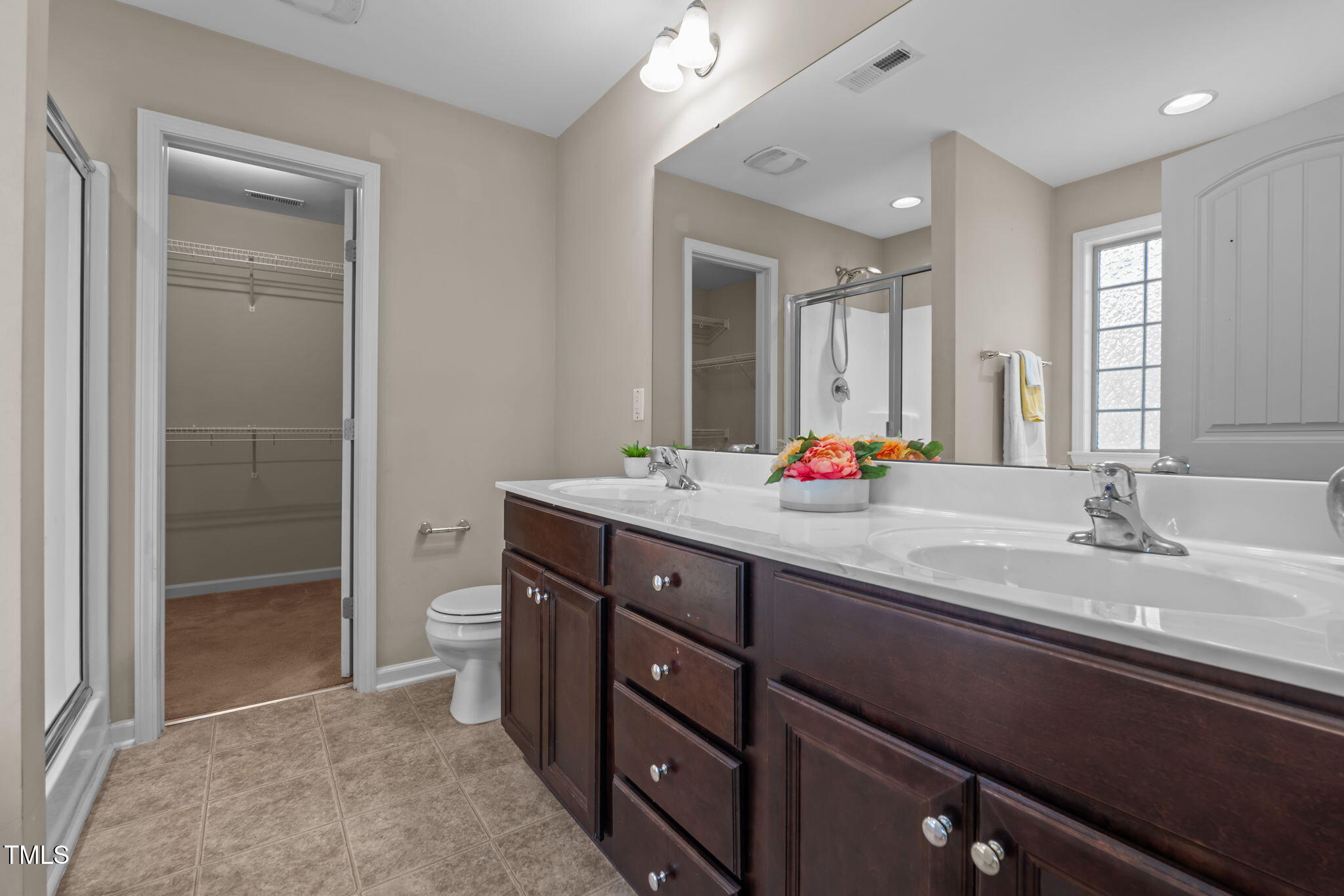 60 Taplow Trail Cameron, NC 28326 - Photo 21 of 50 a bathroom with a double vanity sink and a mirror