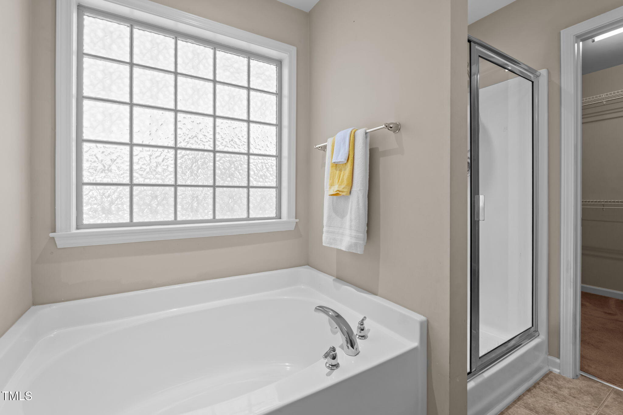 60 Taplow Trail Cameron, NC 28326 - Photo 22 of 50 a white bath tub sitting next to a window