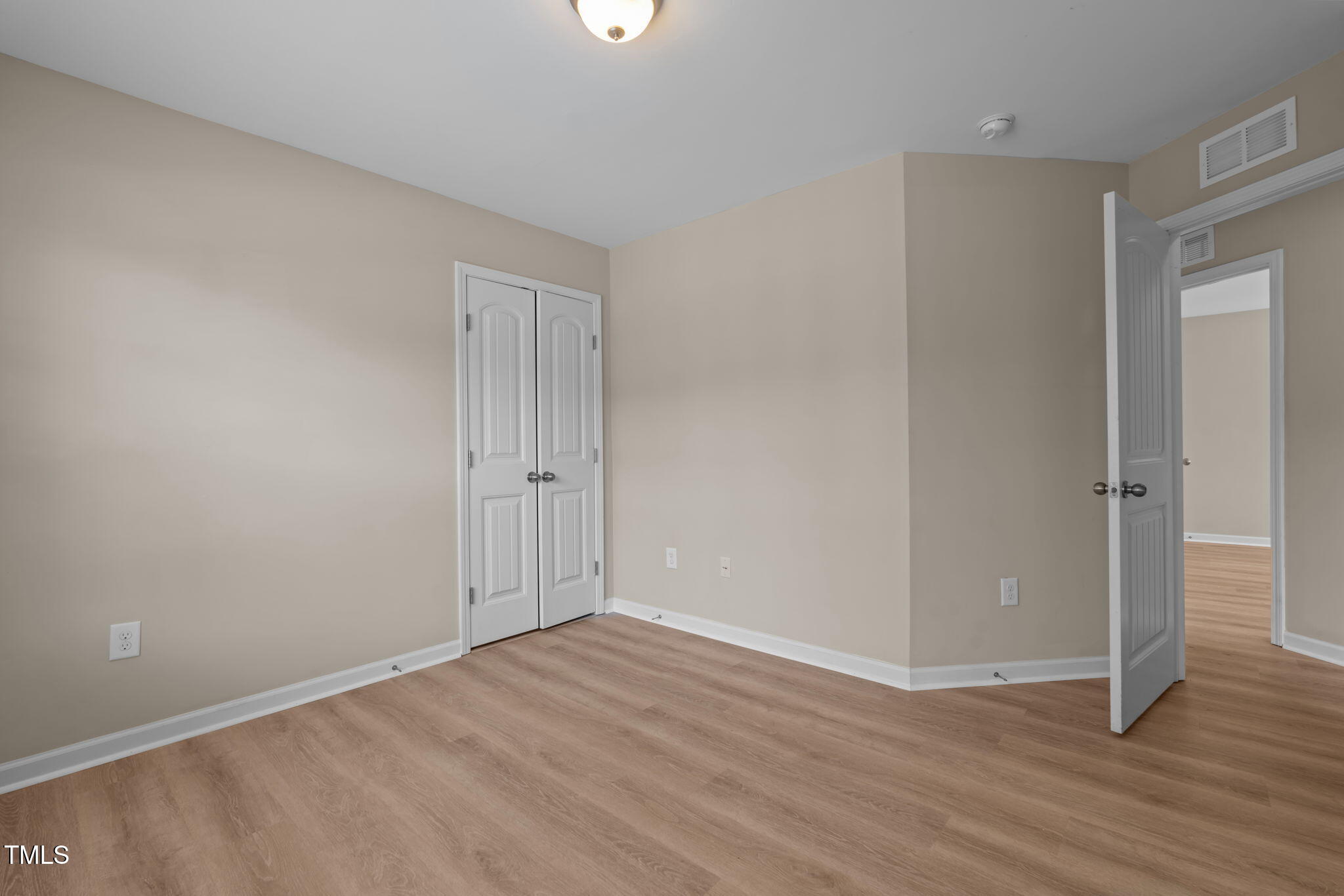 60 Taplow Trail Cameron, NC 28326 - Photo 31 of 50 a view of an empty room with wooden floor