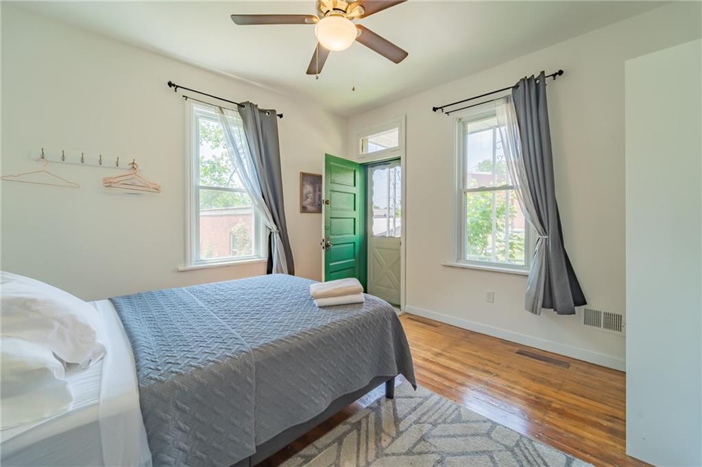 102 Secane Avenue Pittsburgh, PA 15211 - Photo 16 of 50 a bedroom with a bed and a window