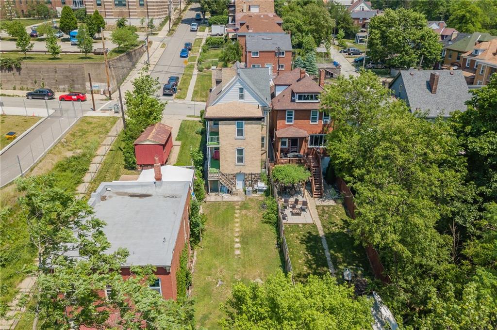 102 Secane Avenue Pittsburgh, PA 15211 - Photo 46 of 50 an aerial view of a house with a garden and swimming pool