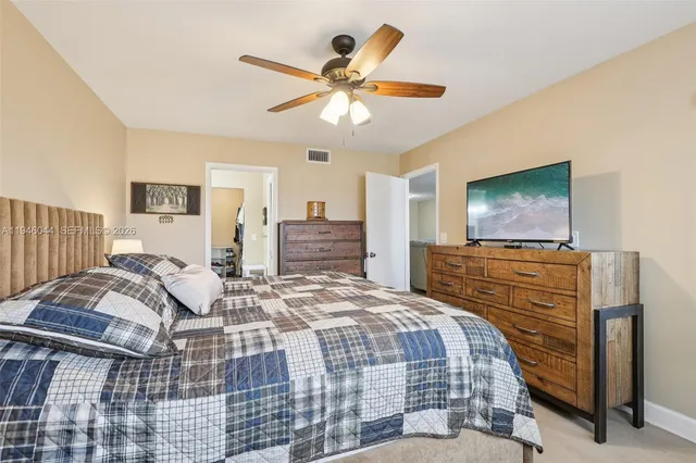 a en suite bathroom with a sink and mirror