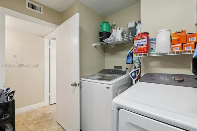 a view of building with yard