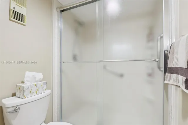 a view of a swimming pool with a terrace