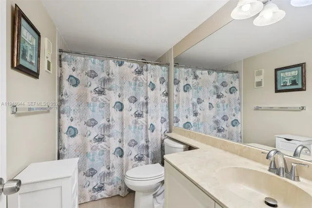 a view of a swimming pool with outdoor seating