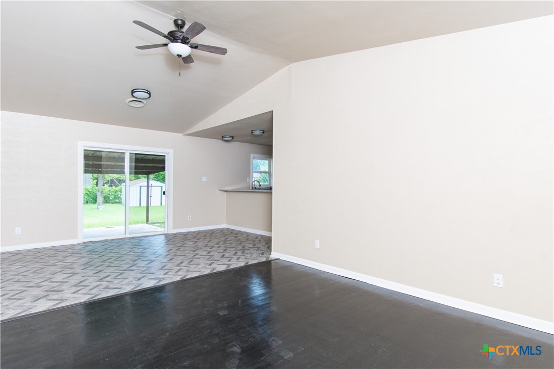 1312 Stephen Street Killeen, TX 76549 - Photo 2 of 19 a view of empty room with wooden floor and fan