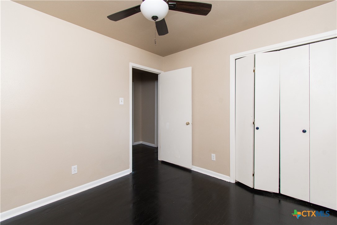 1312 Stephen Street Killeen, TX 76549 - Photo 10 of 19 a view of an empty room with wooden floor