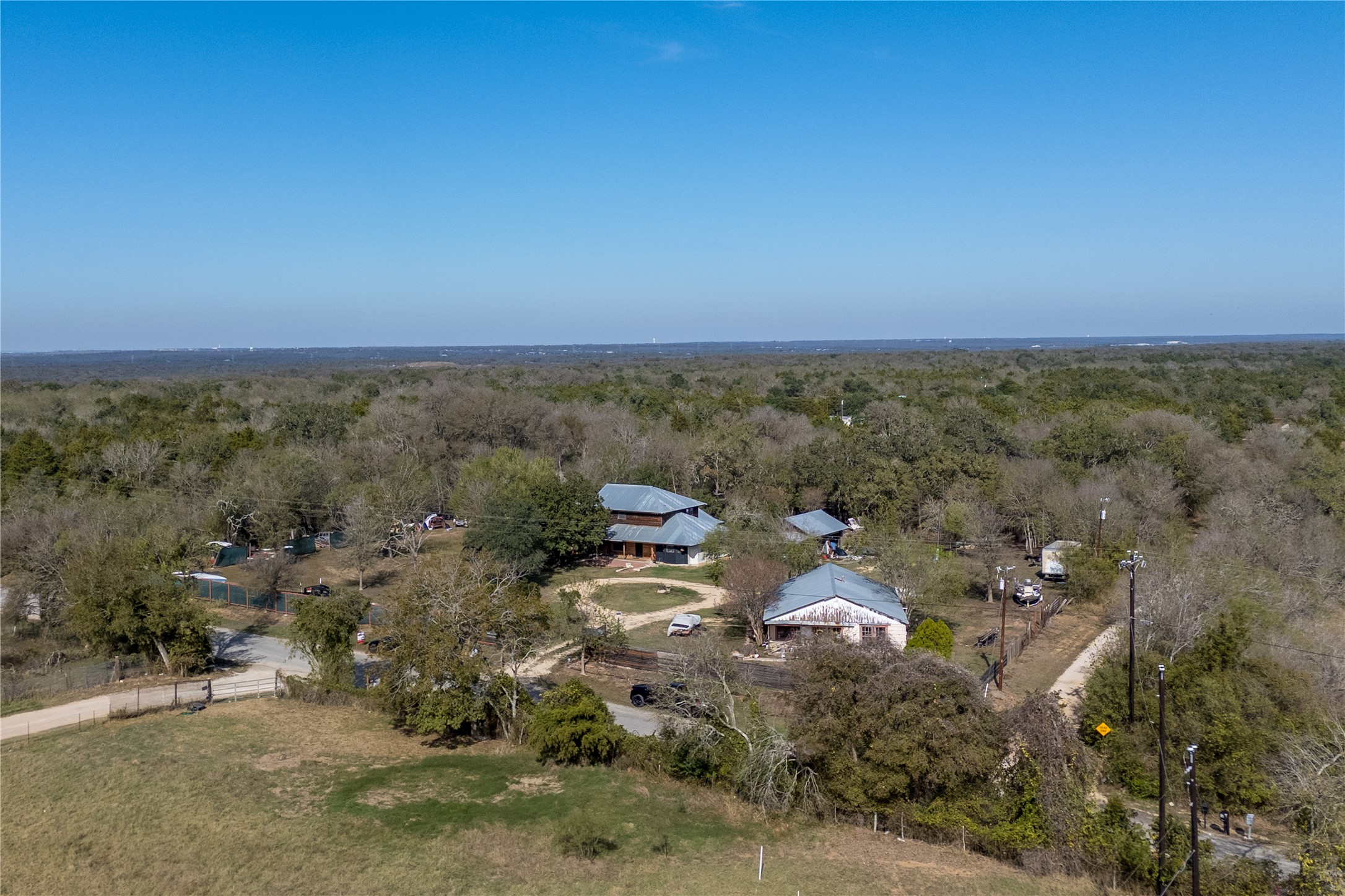 368 Lytton Lane Dale, TX 78616 - Photo 28 of 29 Aerial view of a heavily wooded area