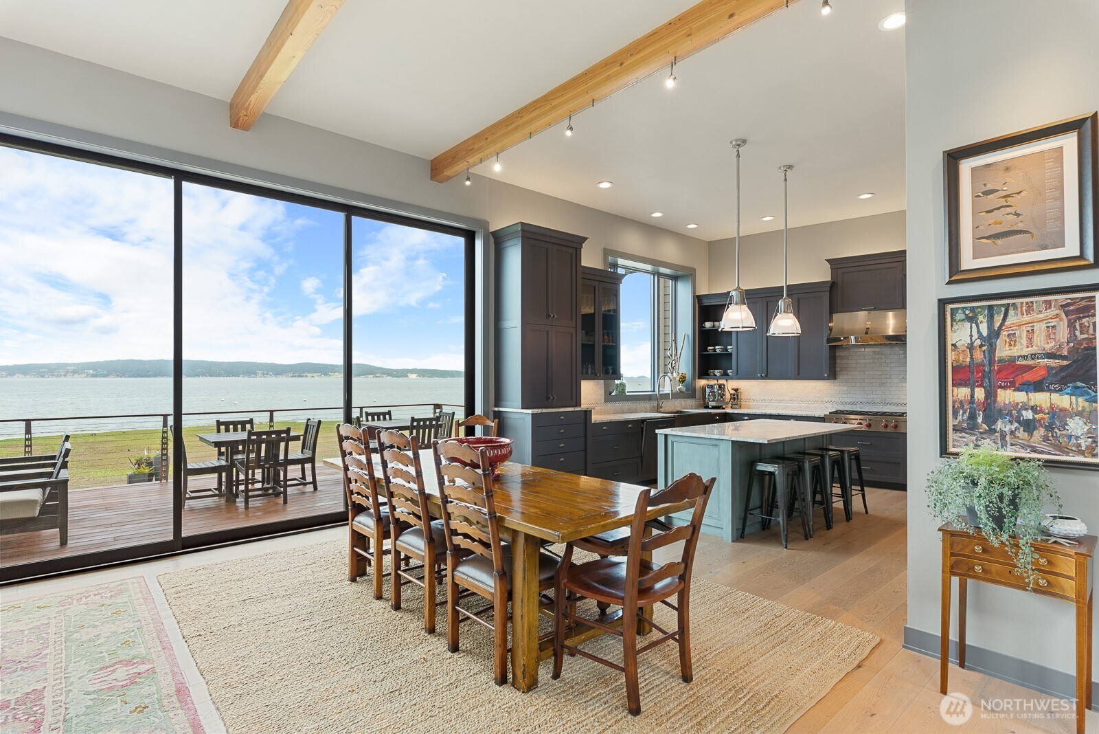 181 Utsalady Road Camano Island, WA 98282 - Photo 12 of 40 a view of a dining room with furniture window and outdoor view