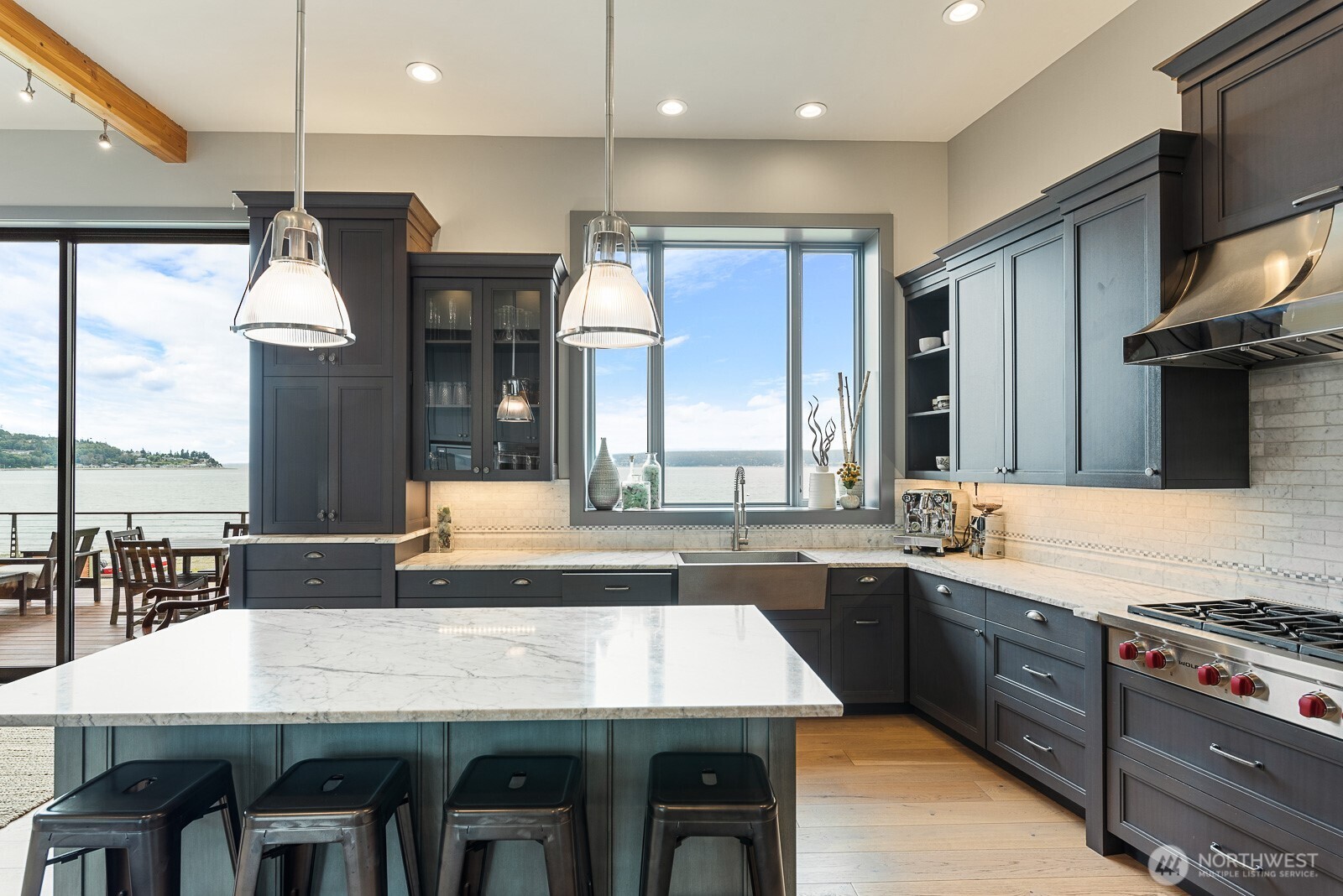 181 Utsalady Road Camano Island, WA 98282 - Photo 14 of 40 a large kitchen with a table and chairs