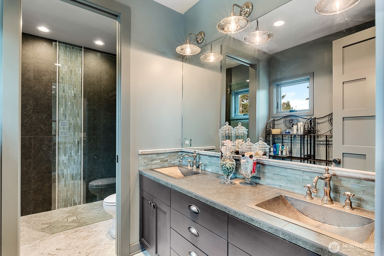 181 Utsalady Road Camano Island, WA 98282 - Photo 28 of 40 a bathroom with a sink double vanity and a mirror