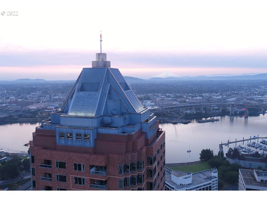 1414 Southwest 3rd Avenue, Unit 2903 Portland, OR 97201 - Photo 1 of 30 a view of a lake with a city