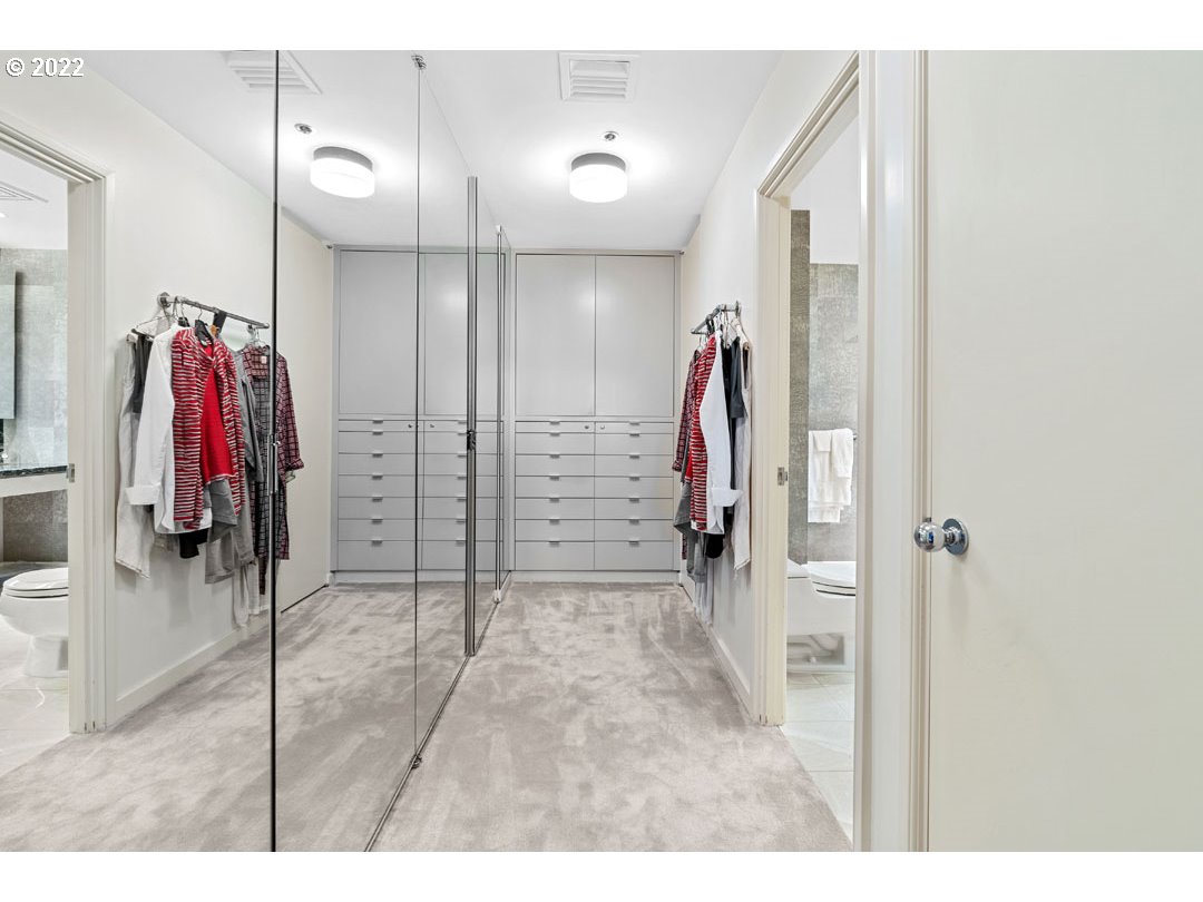 1414 Southwest 3rd Avenue, Unit 2903 Portland, OR 97201 - Photo 22 of 30 a view of a walk in closet with a couch