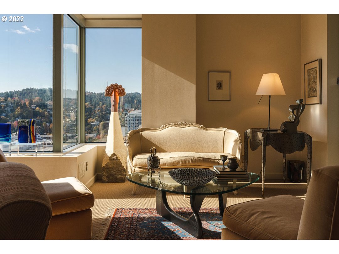 1414 Southwest 3rd Avenue, Unit 2903 Portland, OR 97201 - Photo 7 of 30 a living room with furniture and a lamp