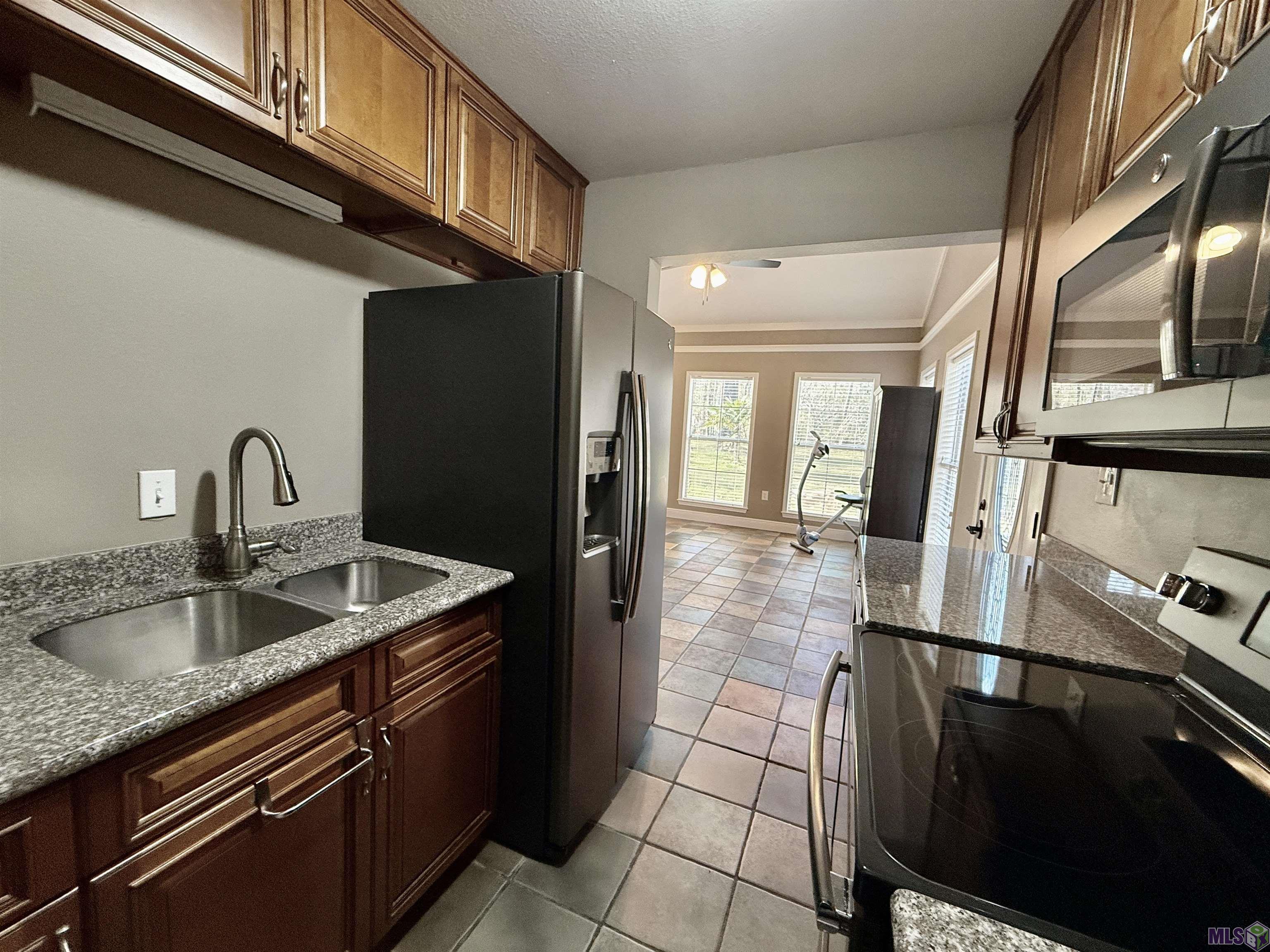 16706 Planchet Road Greenwell Springs, LA 70739 - Photo 11 of 14 DOWNSTAIRS APARTMENT KITCHEN