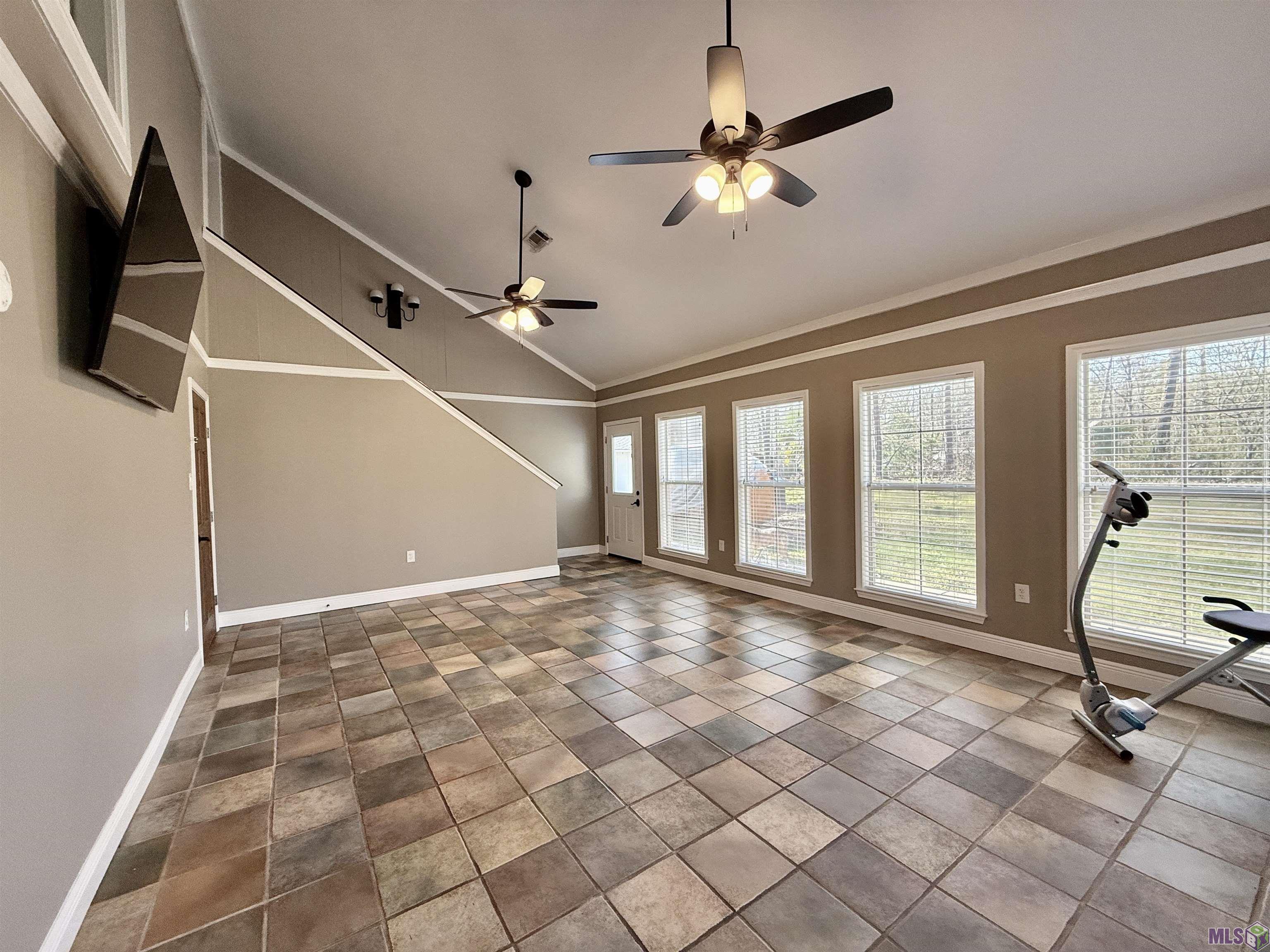 16706 Planchet Road Greenwell Springs, LA 70739 - Photo 27 of 32 DOWNSTAIRS APARTMENT LIVING DINING COMBO SPACE