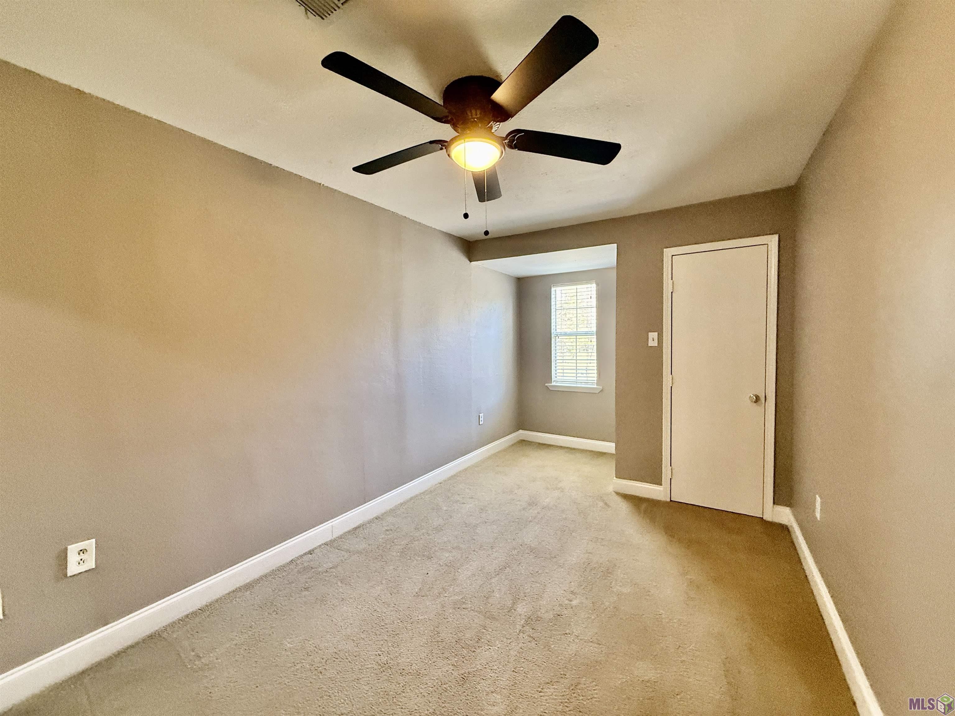 16706 Planchet Road Greenwell Springs, LA 70739 - Photo 4 of 14 UPSTAIRS APARTMENT BEDROOM