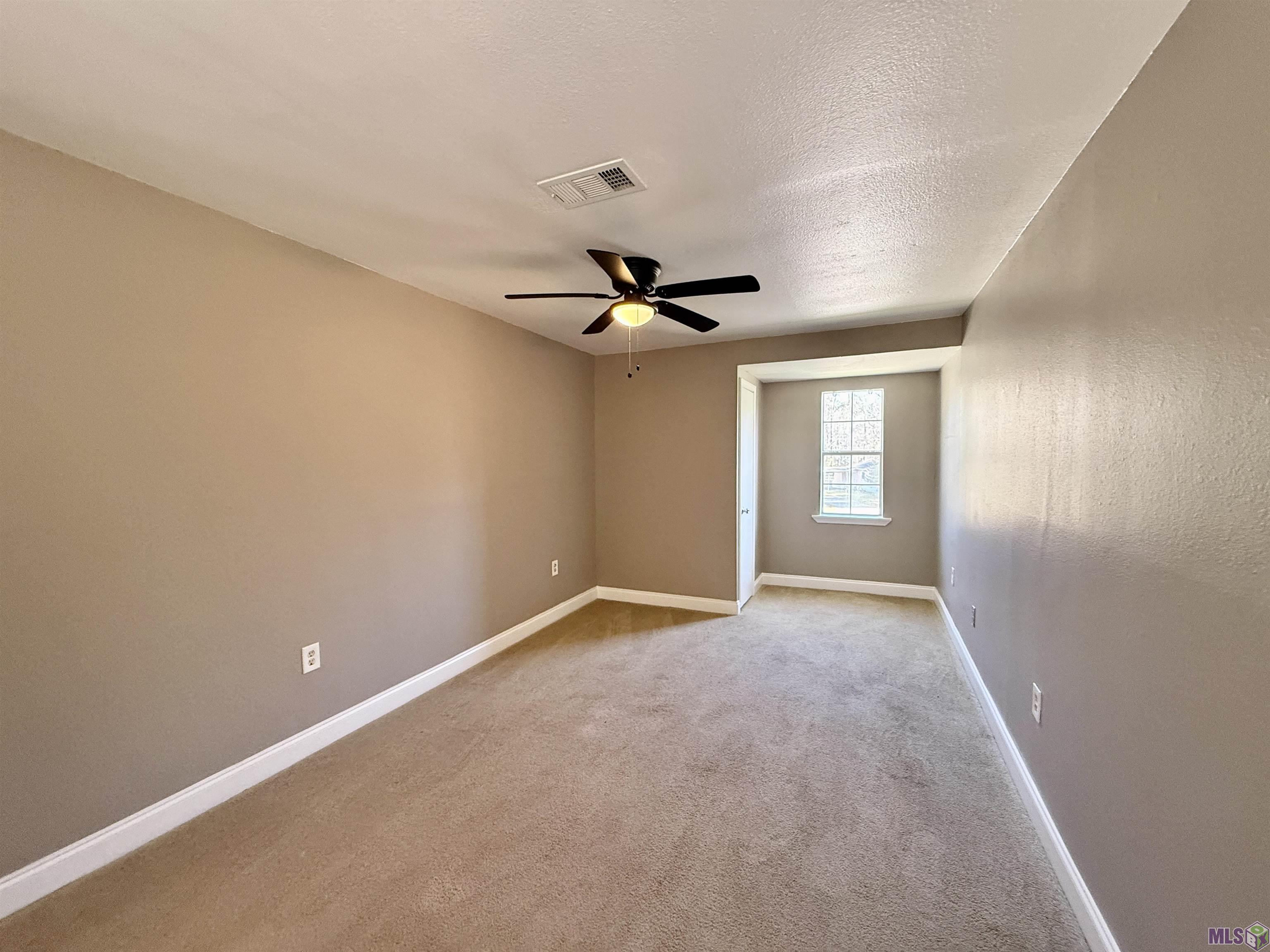 16706 Planchet Road Greenwell Springs, LA 70739 - Photo 5 of 14 UPSTAIRS APARTMENT LIVING ROOM