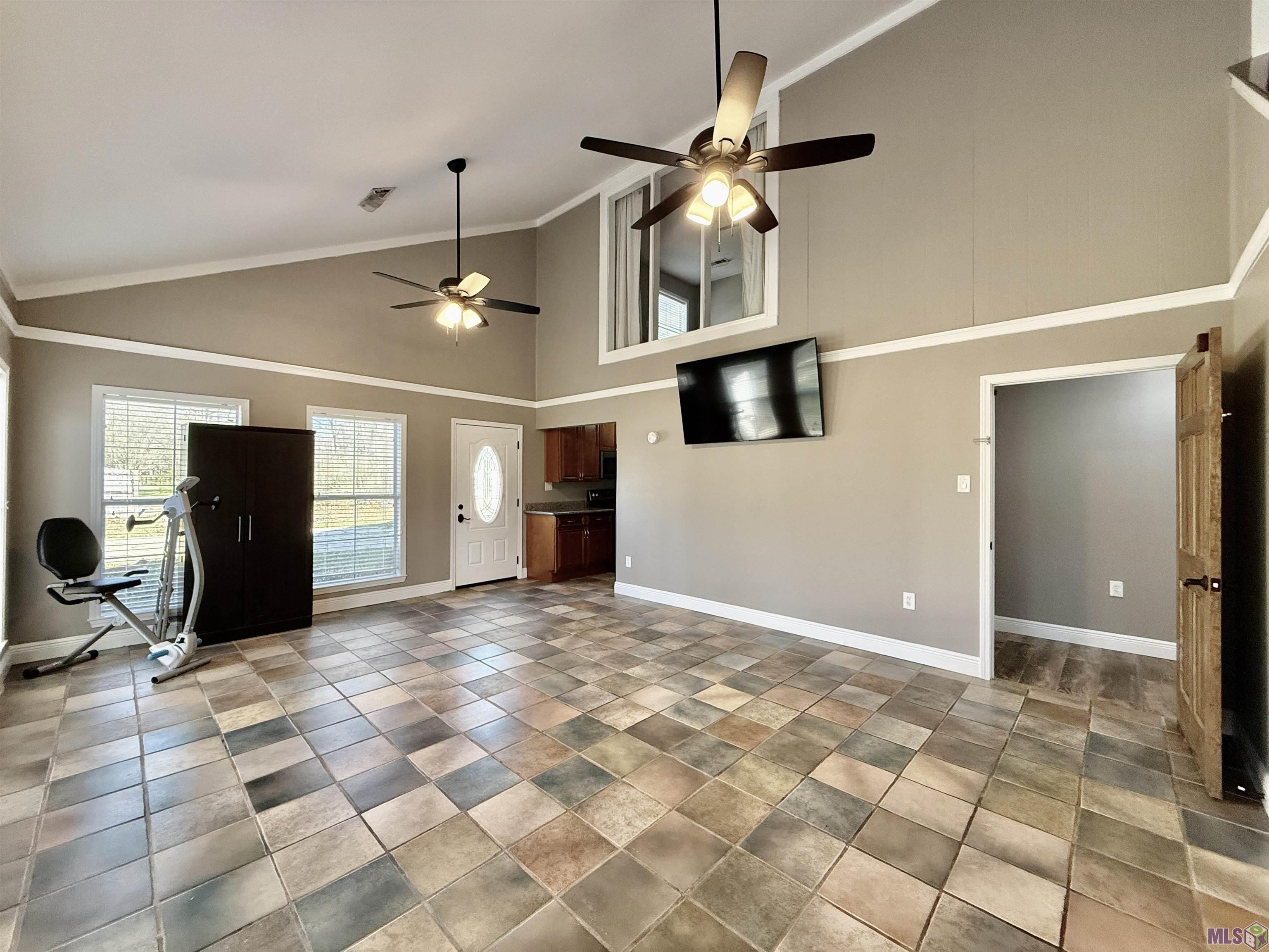 16706 Planchet Road Greenwell Springs, LA 70739 - Photo 10 of 14 DOWNSTAIRS APARTMENT LIVING/DINING COMBO