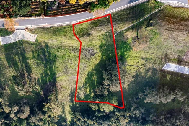 a view of a hallway with a white house and white walls