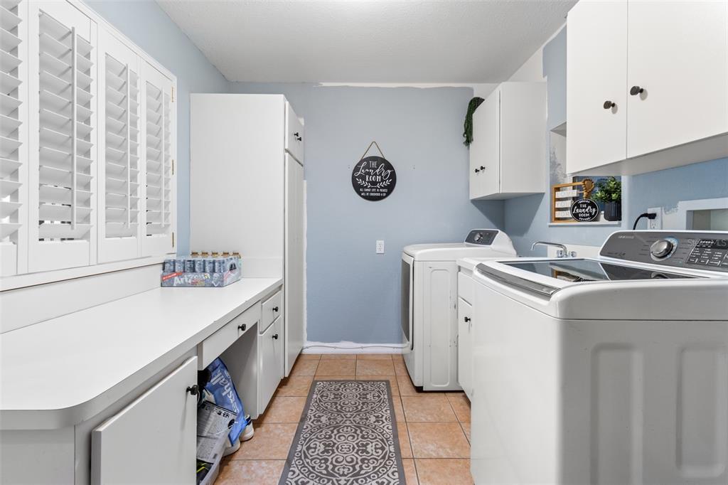 5301 Merrifield Court Spring Hill, FL 34608 - Photo 26 of 46 a utility room with dryer and washer