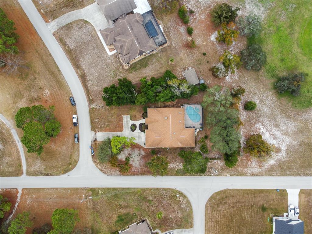 5301 Merrifield Court Spring Hill, FL 34608 - Photo 44 of 46 an aerial view of a house with outdoor space