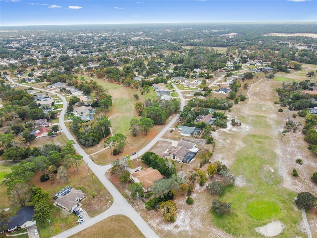 5301 Merrifield Court Spring Hill, FL 34608 - Photo 45 of 46 an aerial view of residential houses with outdoor space