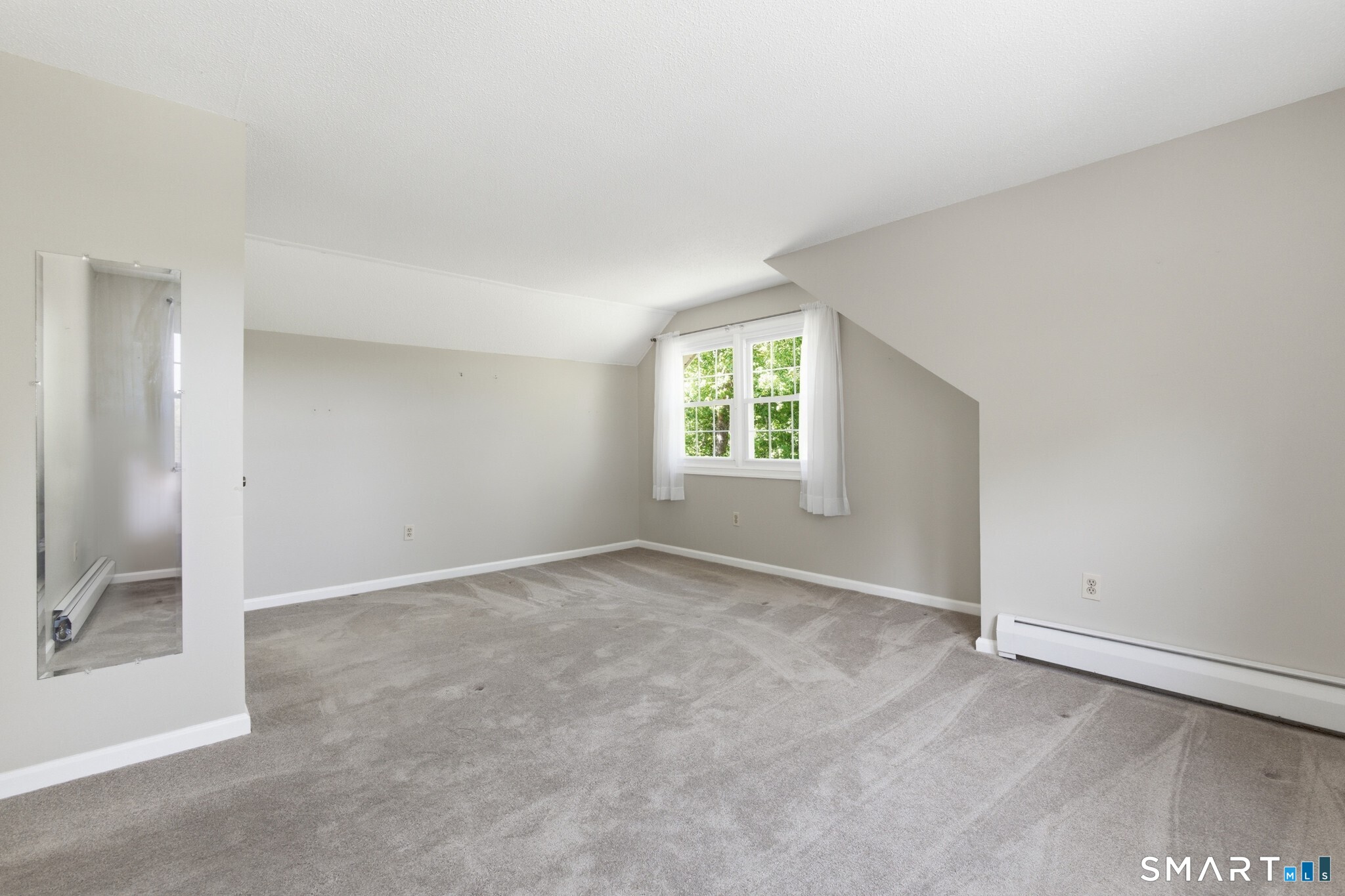 70 Mahoney Road Colchester, CT 06415 - Photo 26 of 40 an empty room with windows