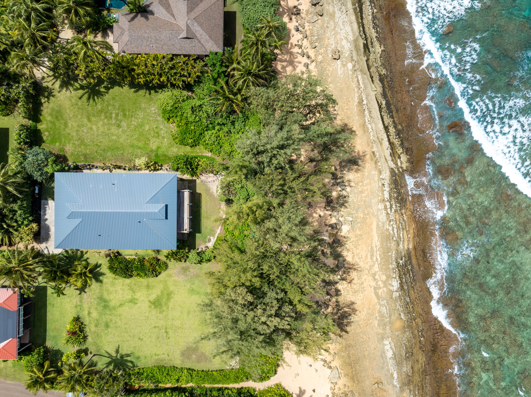 7312 Alealea Road Hanalei, HI 96714 - Photo 26 of 30 an aerial view of a house with a yard