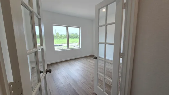 a view of wooden floor and staircase