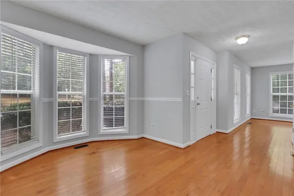 an empty room with windows