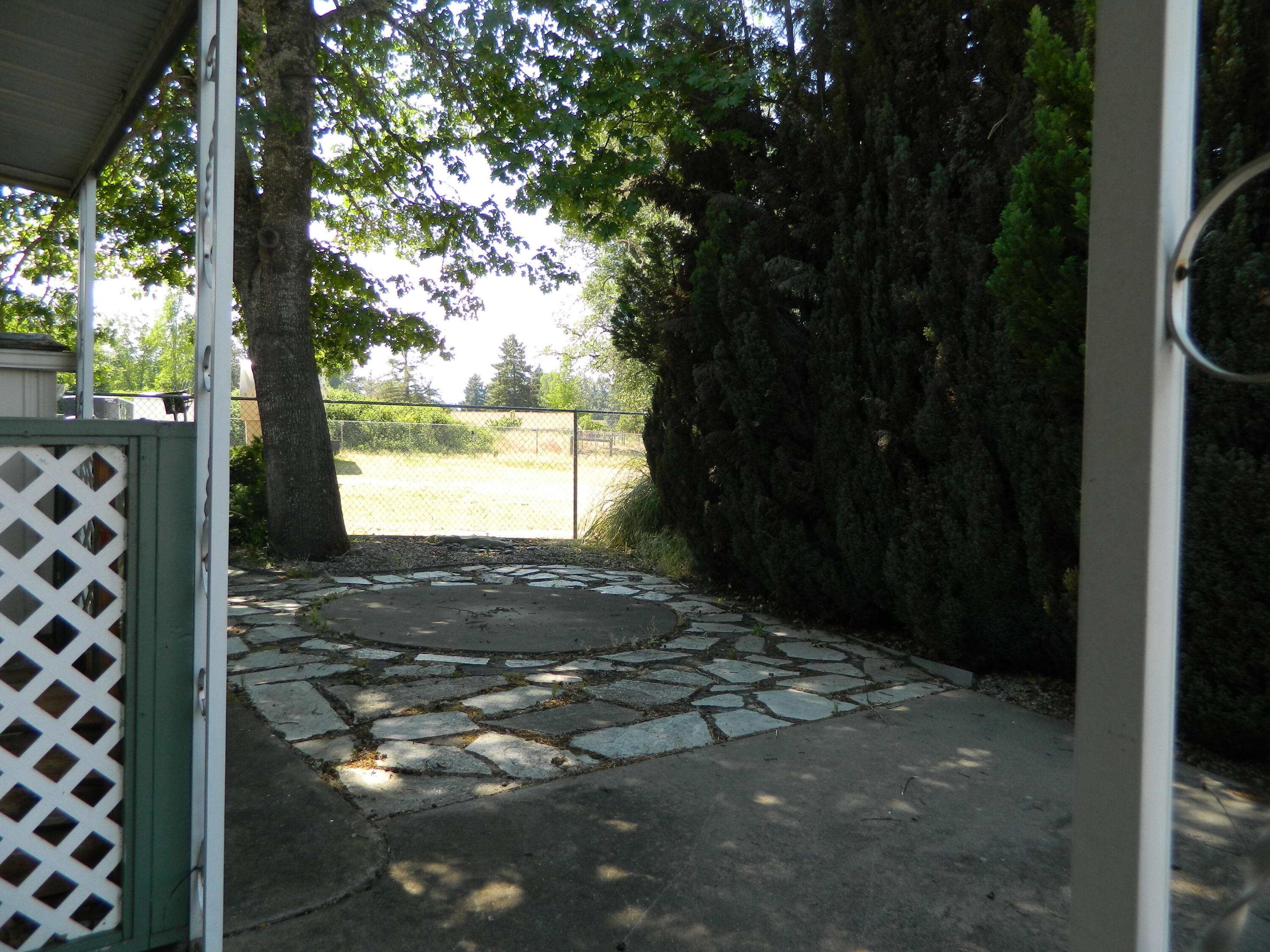 2427 Southwest Webster Road Grants Pass, OR 97526 - Photo 27 of 30 Behind the Flower Pots
