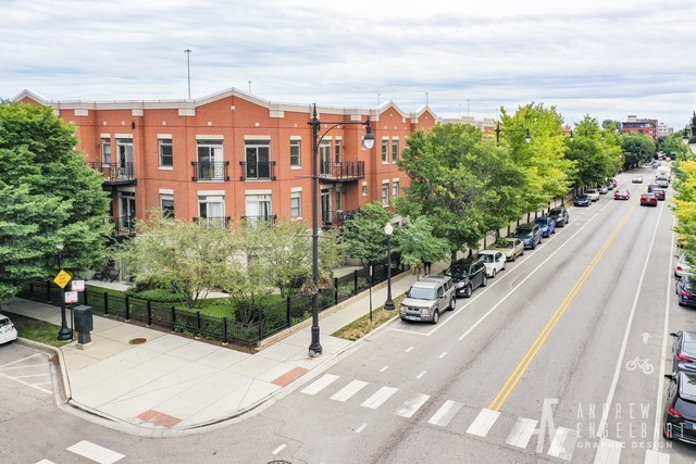 757 West 14th Street, Unit 1B Chicago, IL 60607 - Photo 1 of 13 a view of a swimming pool with an outdoor seating
