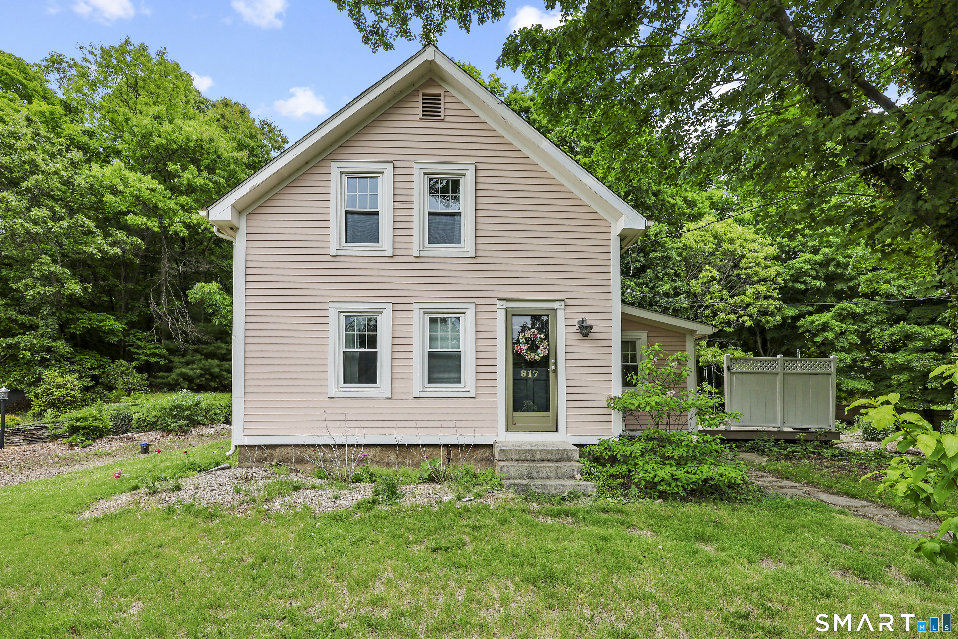 917 Hopewell Road Glastonbury, CT 06033 - Photo 2 of 39 a view of a house with a yard