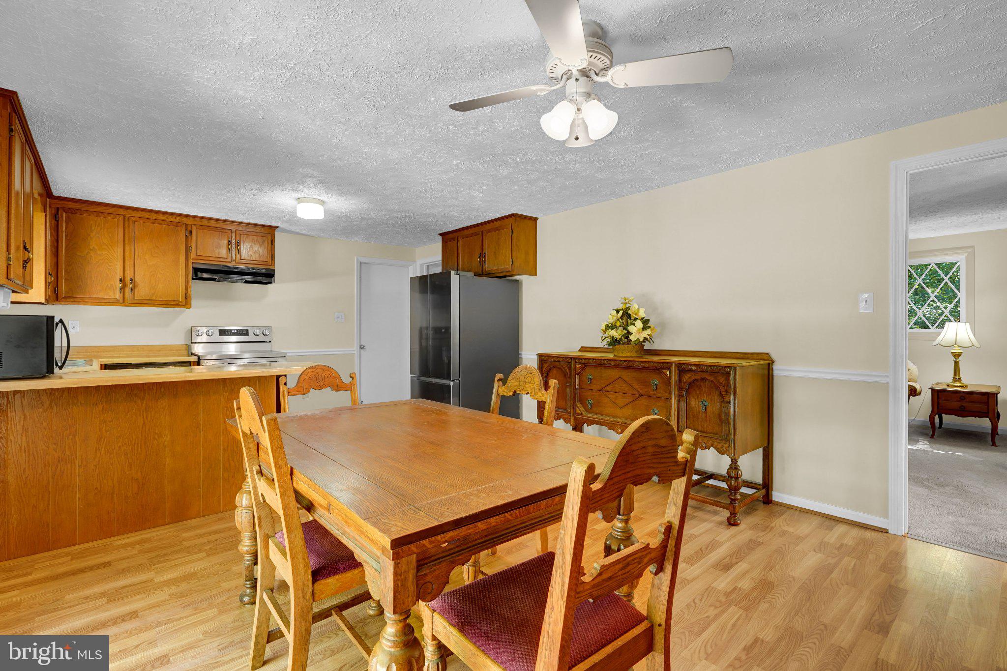 6067 Pilgrims Rest Road Broad Run, VA 20137 - Photo 18 of 58 Inviting kitchen with warm wood tones.