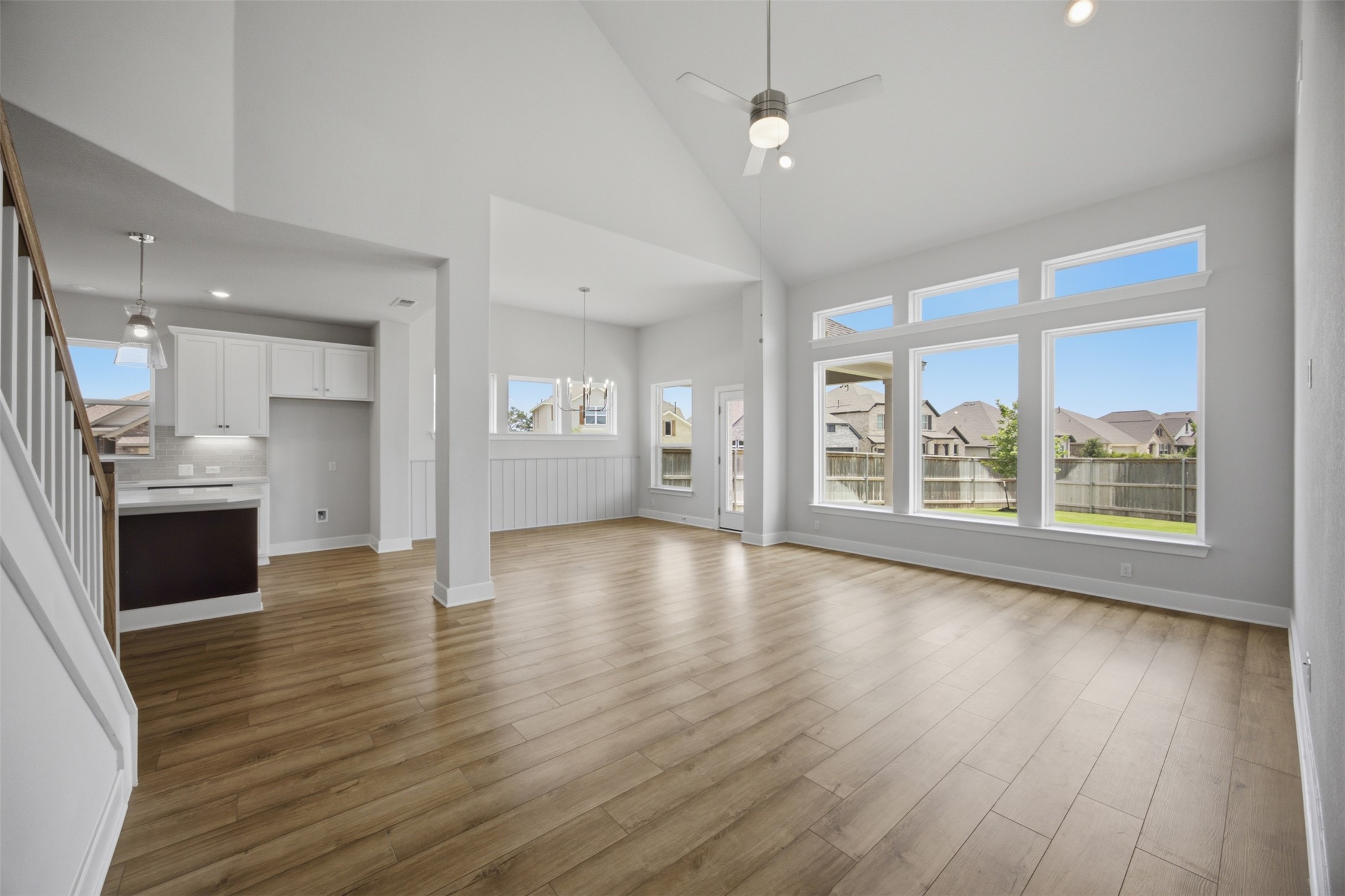 2101 Little Snake Way Georgetown, TX 78633 - Photo 18 of 37 Natural light floods this spacious gathering area with soaring vaulted ceilings.