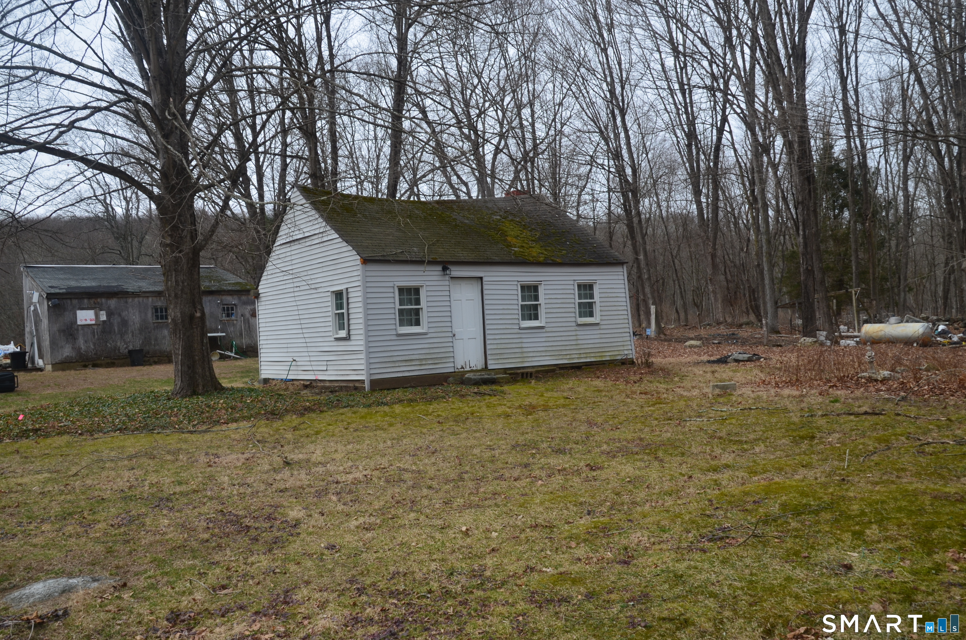 131 Highway 6 Andover, CT 06232 - Photo 4 of 12 a view of a house with a yard