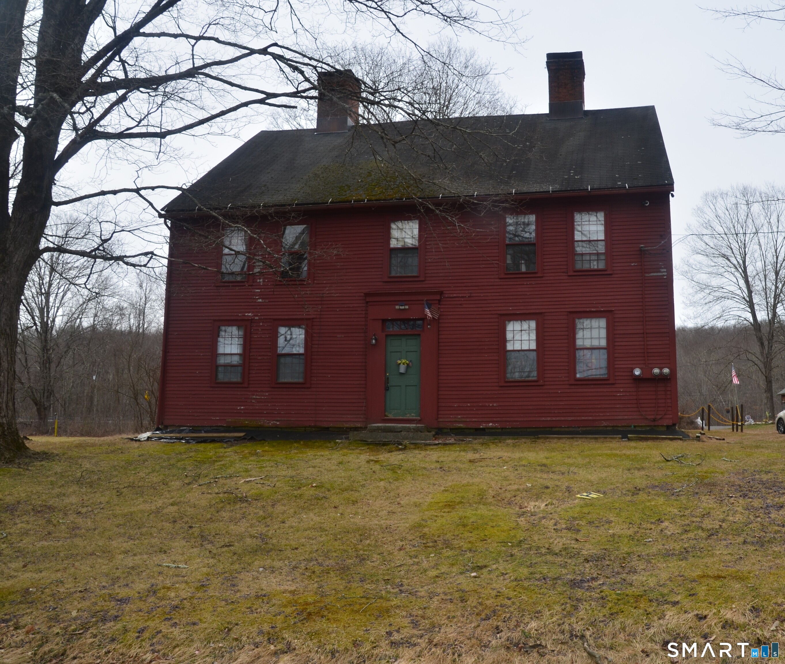 131 Highway 6 Andover, CT 06232 - Photo 5 of 12 a view of a brick house next to a yard