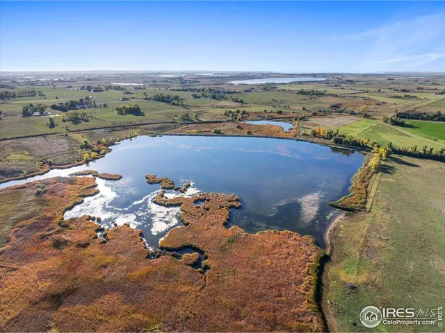 an aerial view of a houses with outdoor space