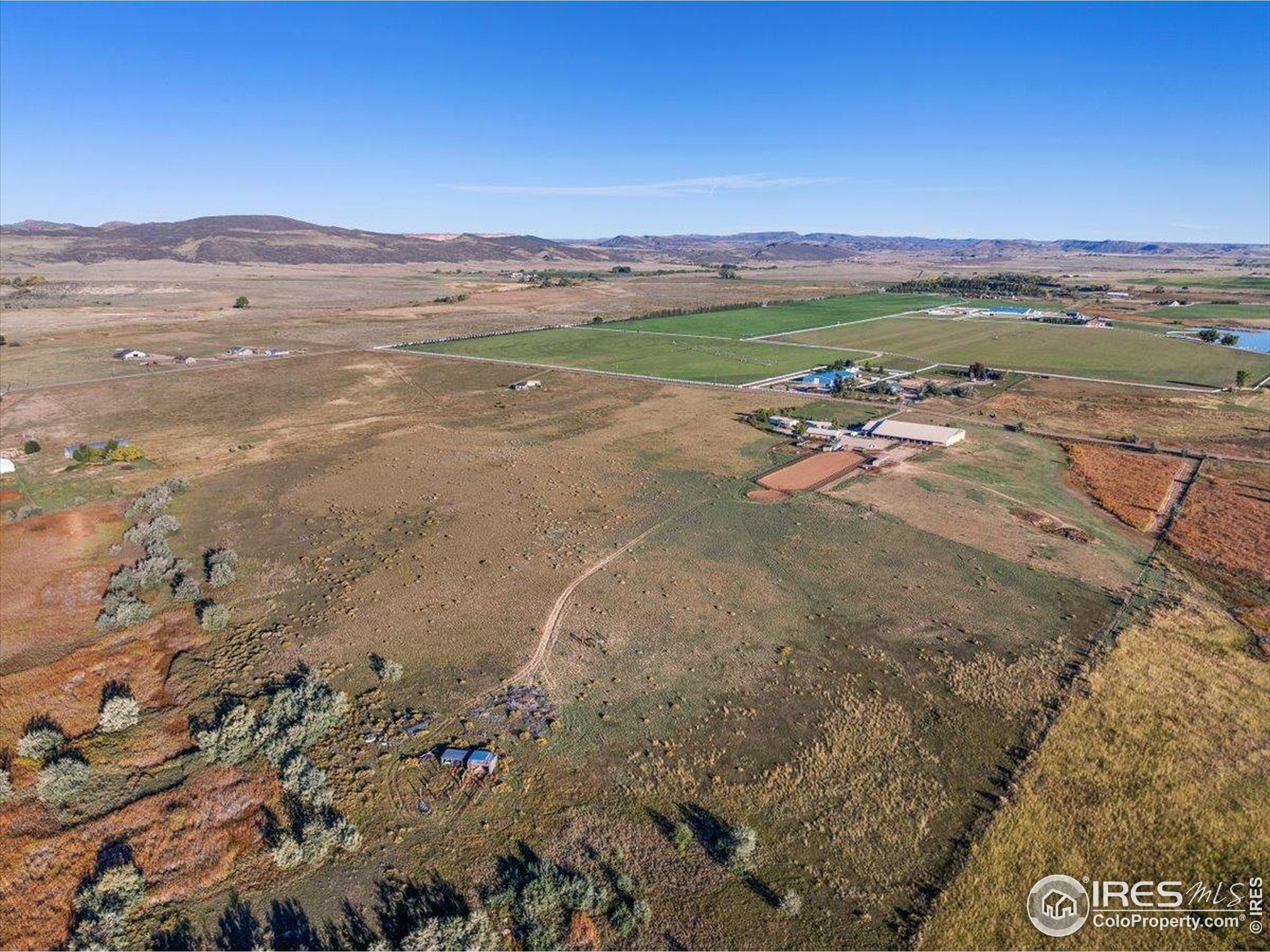 1721 West Co Road 68 Fort Collins, CO 80524 - Photo 13 of 50 a view of a lake with a mountain
